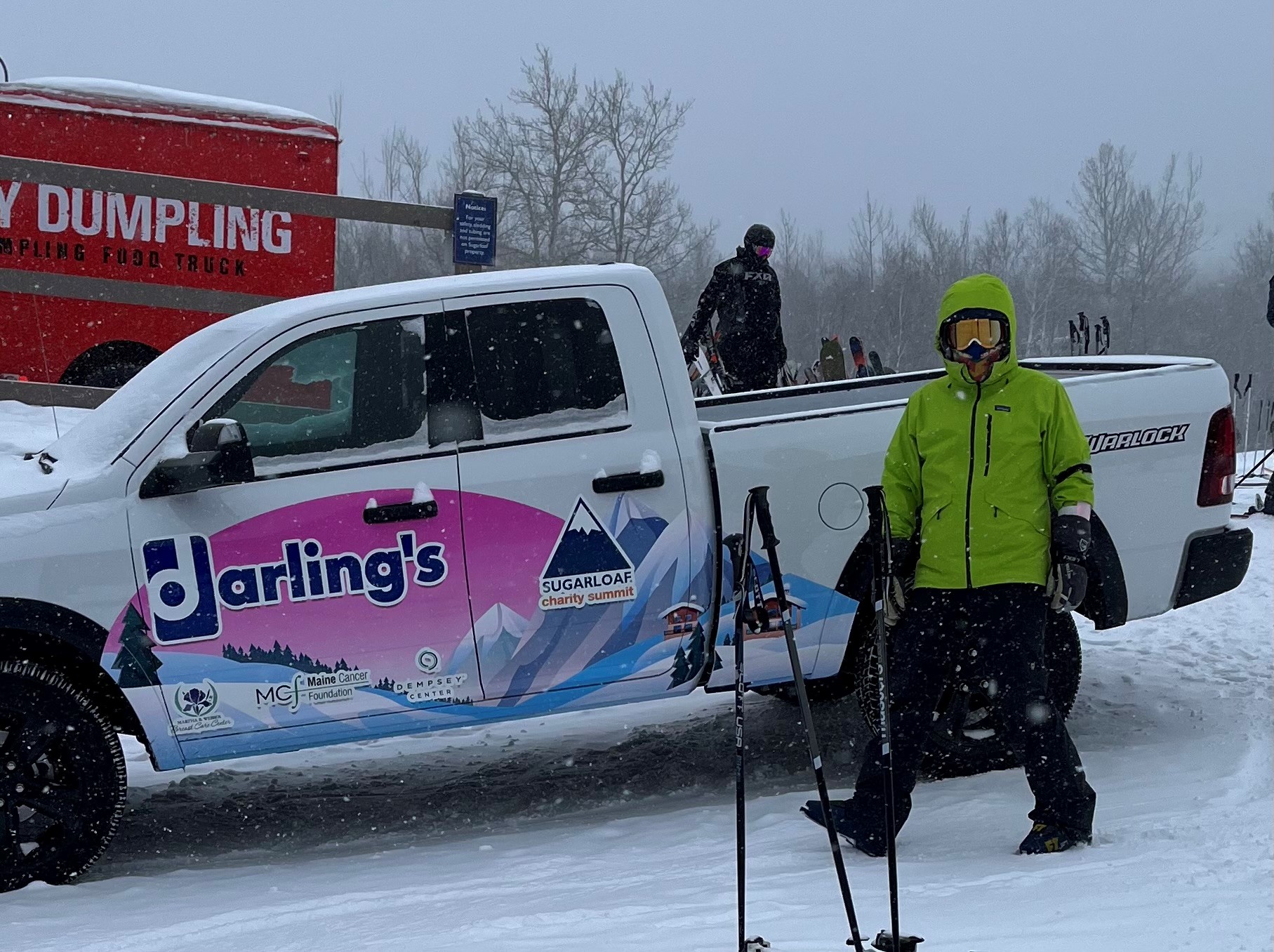 Attorney Gamache takes a quick break from skiing during the charity event.